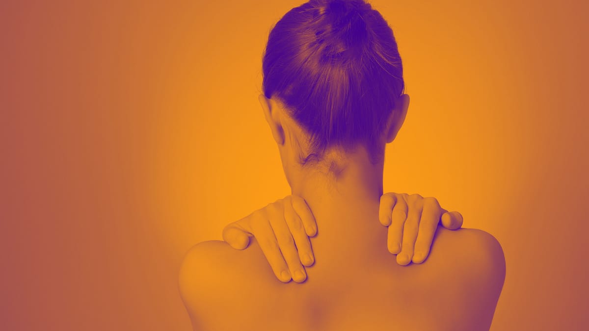 Woman Holding Shoulders